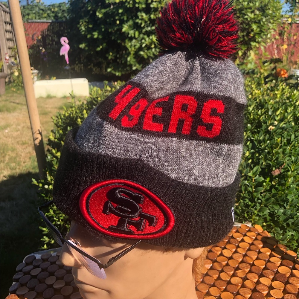 New Era NFL 49ERS Pom Beanie Hat - Black & Gray with Red Accents Size One